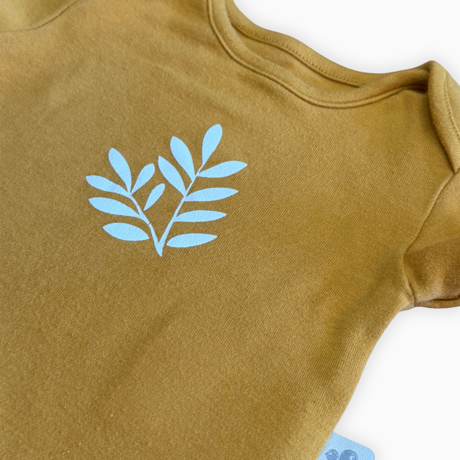 Cache-couche moutarde imprimé feuillage | Perlimpinpin | 9 mois