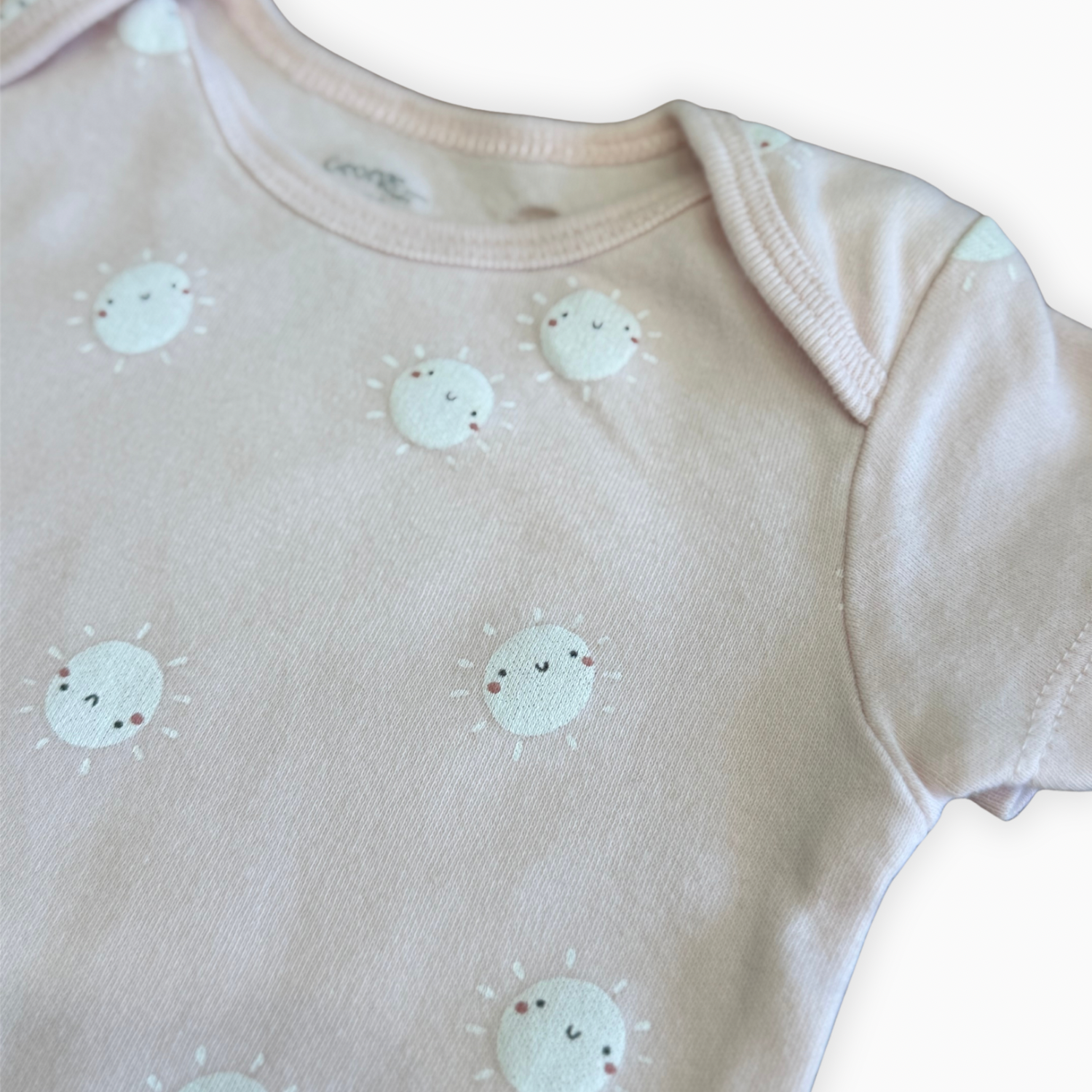 Cache-couche rose à motifs soleils | George | 3–6 mois