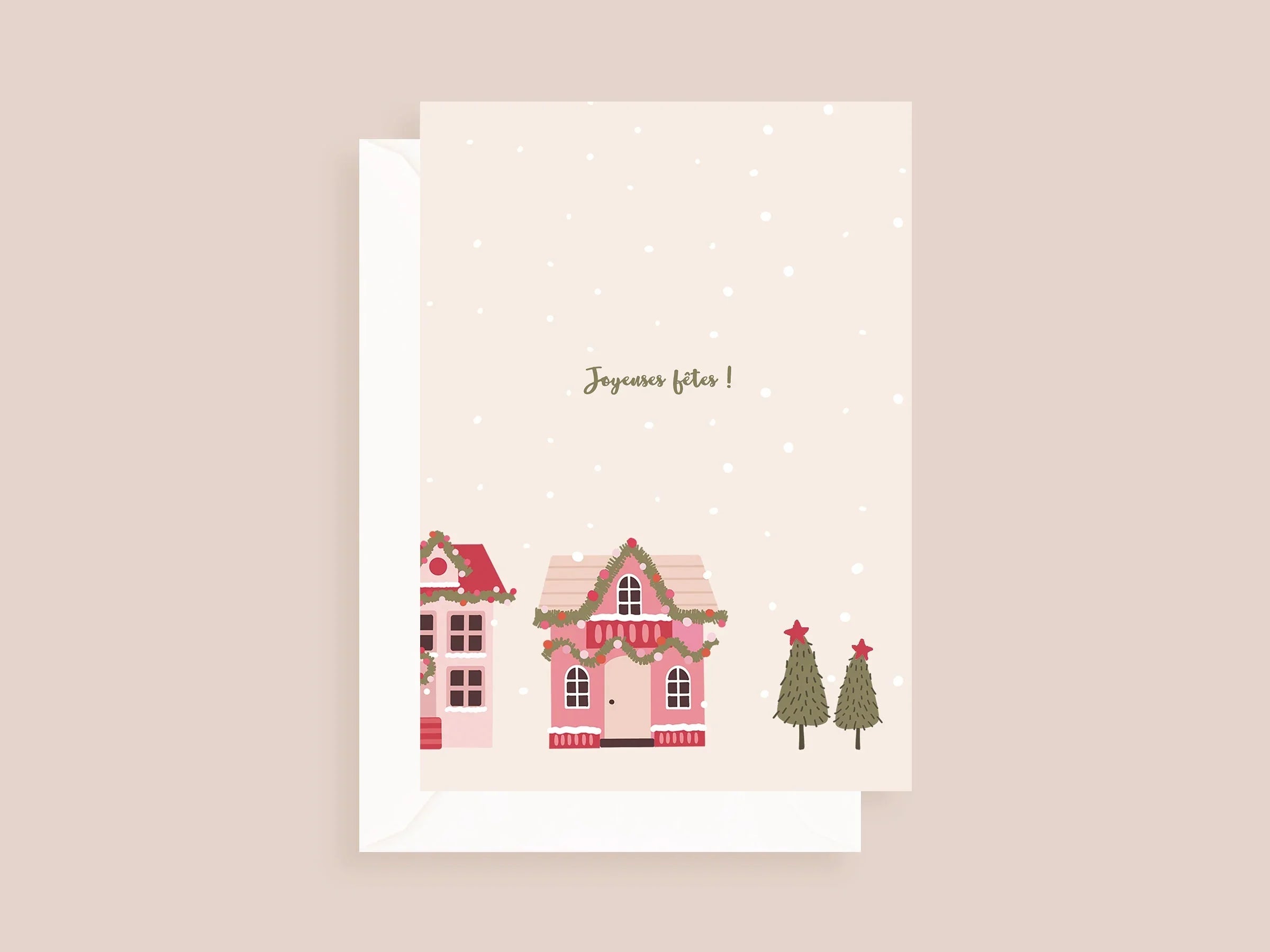 Carte de vœux Noël avec maisons décorées, sapins et neige, texte Joyeuses fêtes