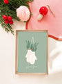 Carte de vœux illustrée avec mitaines blanches, feuillage de sapin et texte joyeuses fêtes