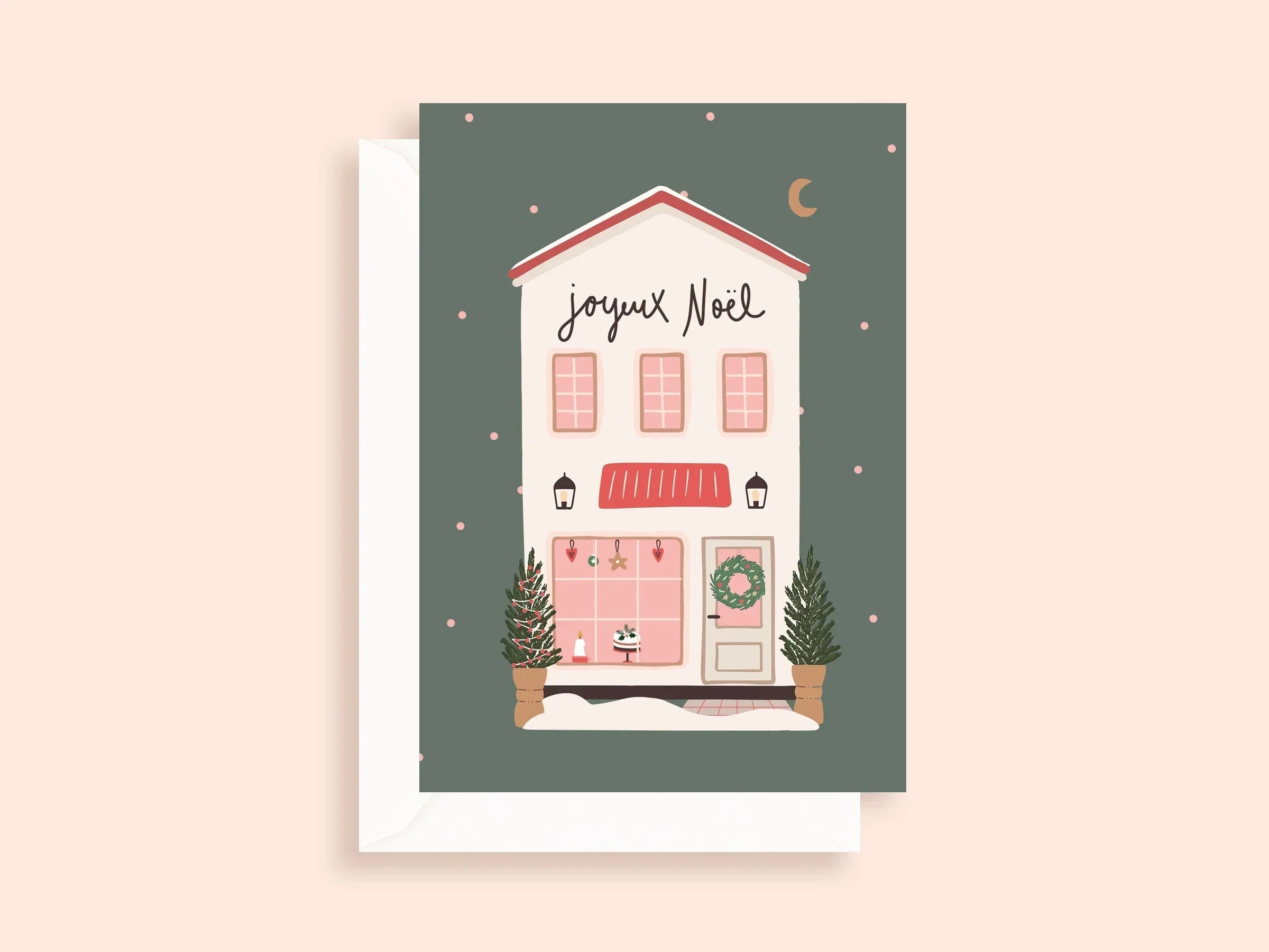 Carte de Noël illustrée avec maison décorée, sapins, couronne et texte joyeux Noël